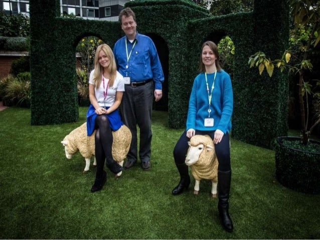 Solo13sheep Laura, Martin and Lou sitting on some toy sheep at the British Library