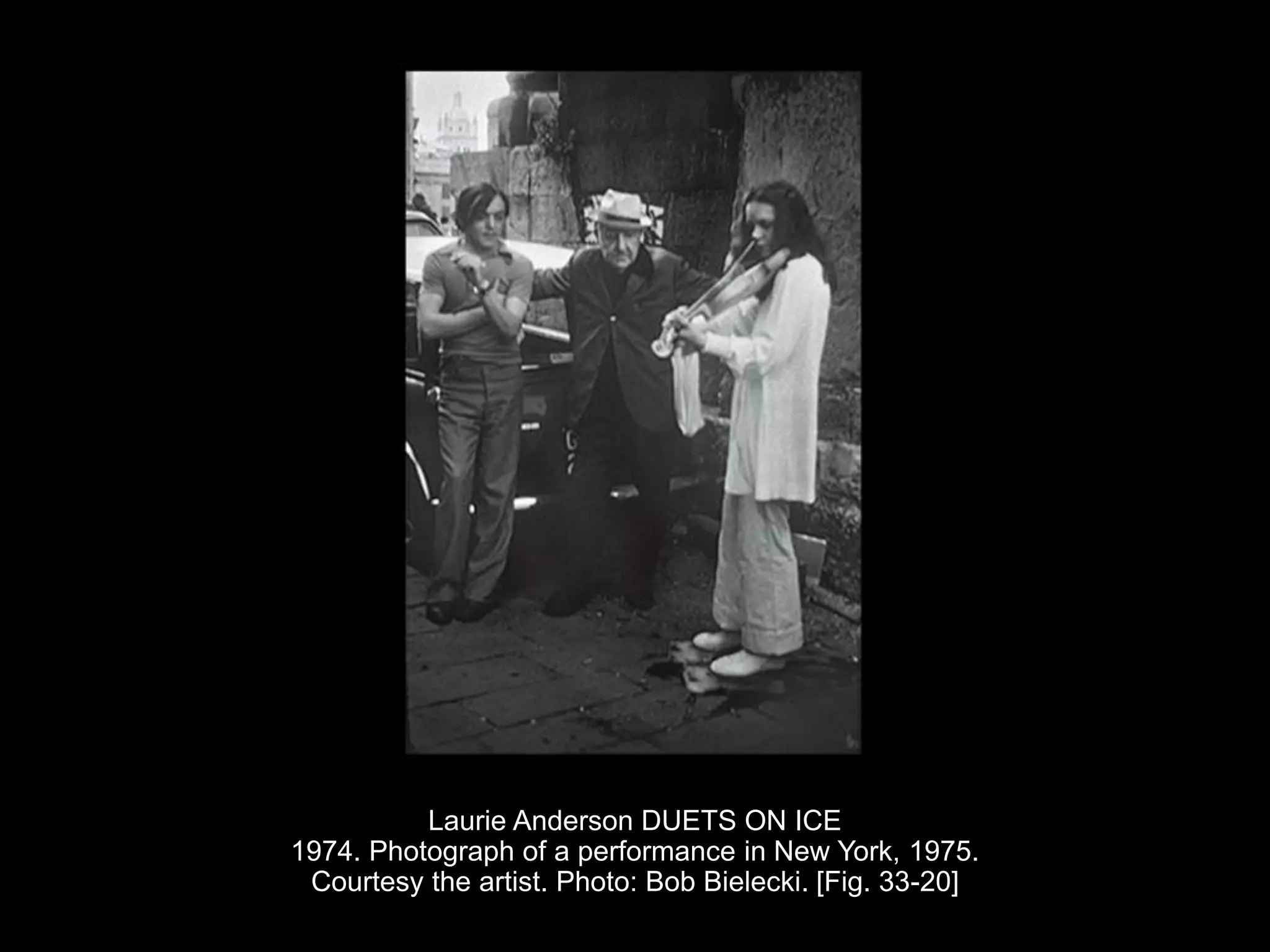 Laurie Anderson DUETS ON ICE
1974. Photograph of a performance in New York, 1975.
Courtesy the artist. Photo: Bob Bielecki. [Fig. 33-20]
 