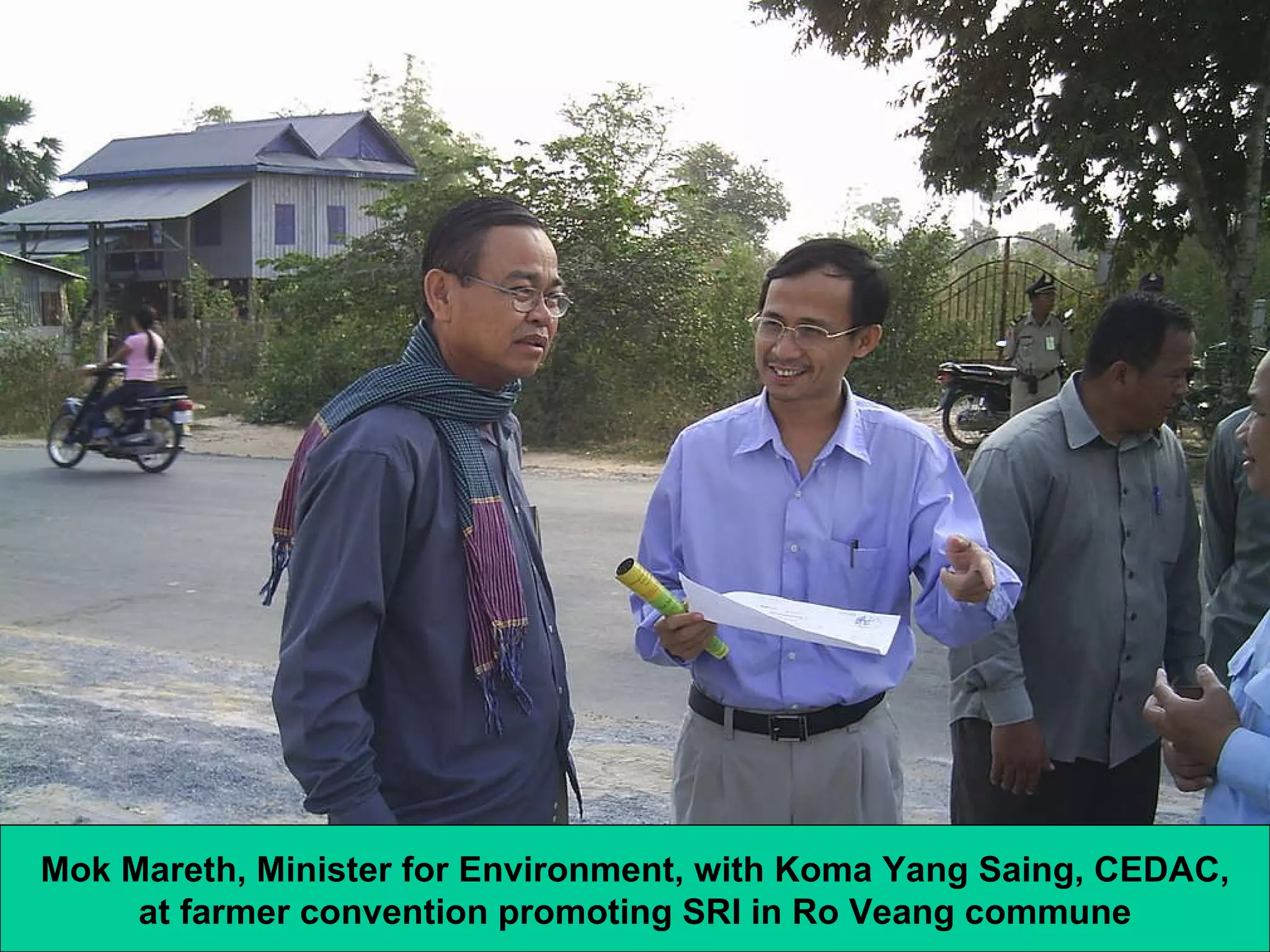 Mok Mareth, Minister for Environment, with Koma Yang Saing, CEDAC, at farmer convention promoting SRI in Ro Veang commune 