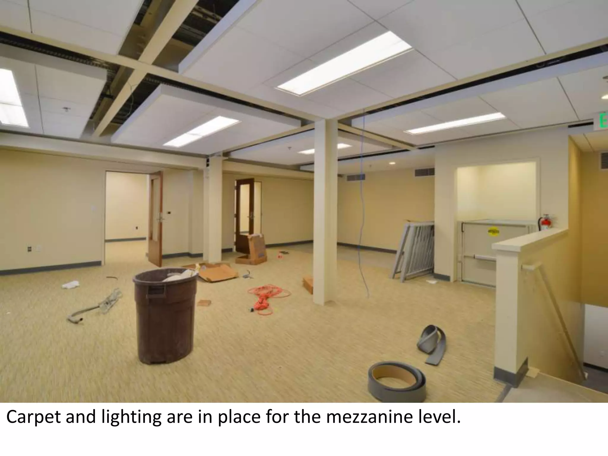 Carpet and lighting are in place for the mezzanine level. 