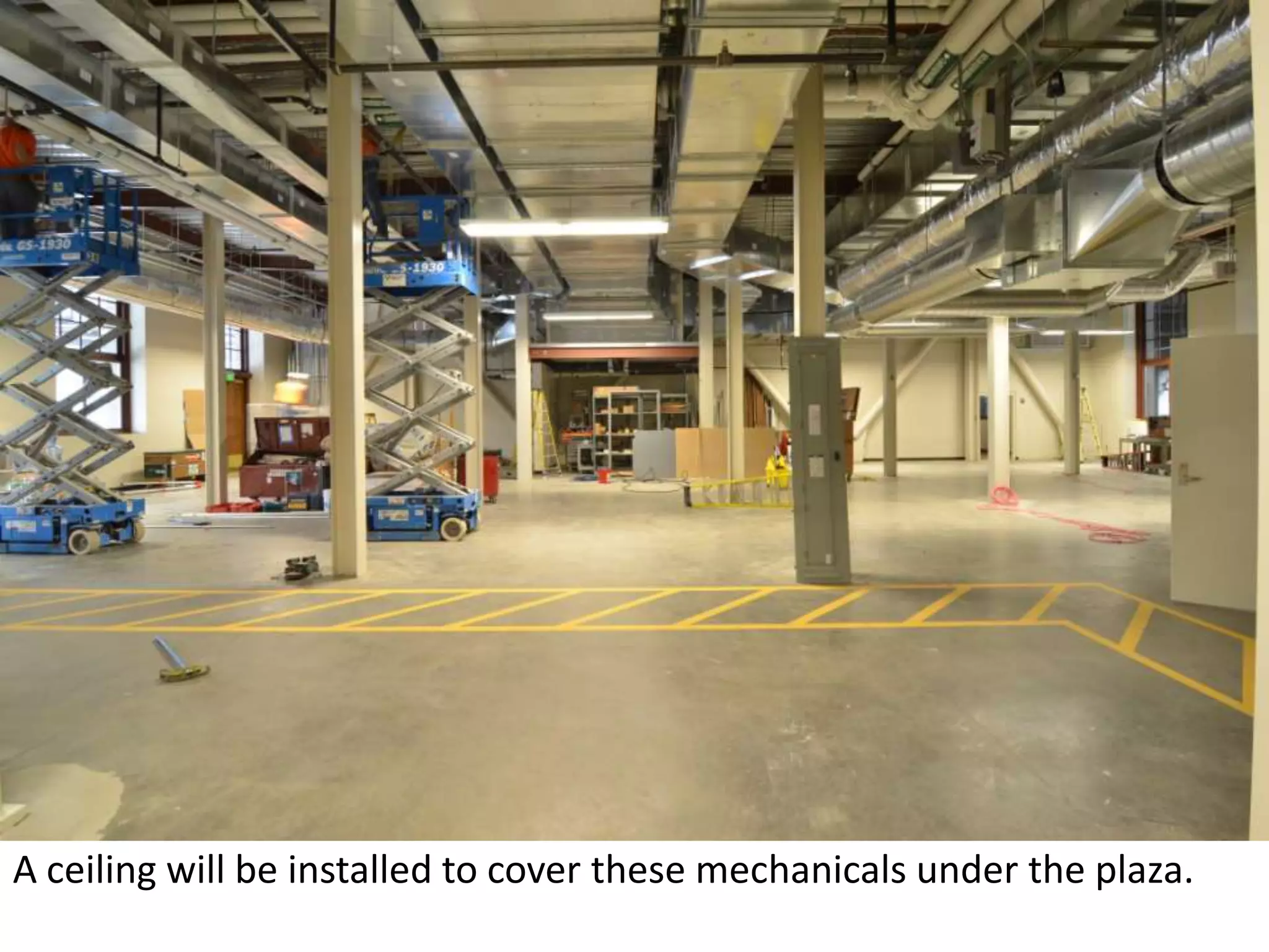 A ceiling will be installed to cover these mechanicals under the plaza.  