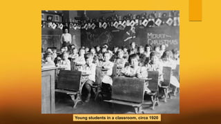 Young students in a classroom, circa 1920
 