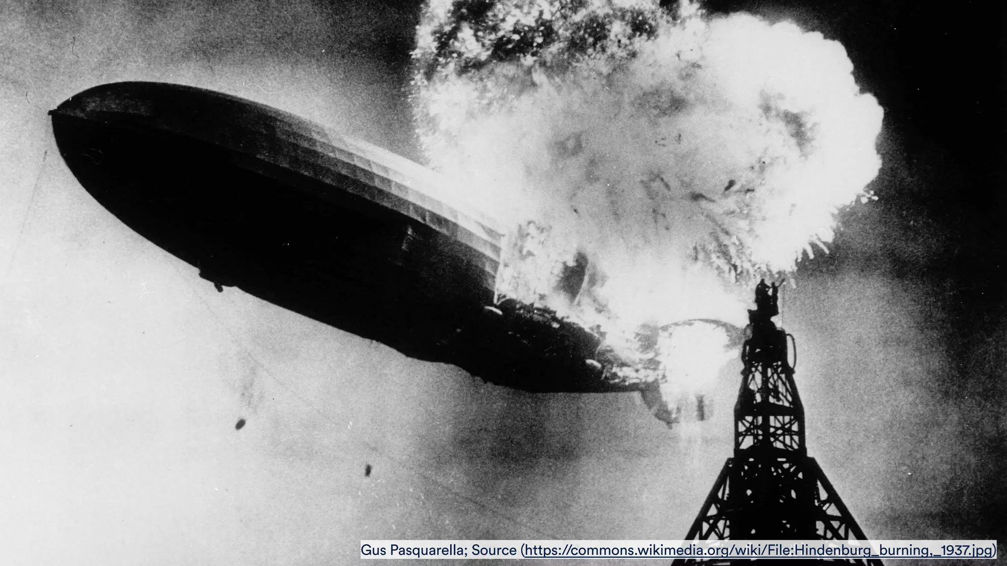 Gus Pasquarella; Source (https://commons.wikimedia.org/wiki/File:Hindenburg_burning,_1937.jpg)
 