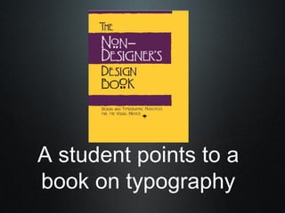 A student points to a
book on typography
 