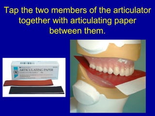 Tap the two members of the articulator
together with articulating paper
between them.
 