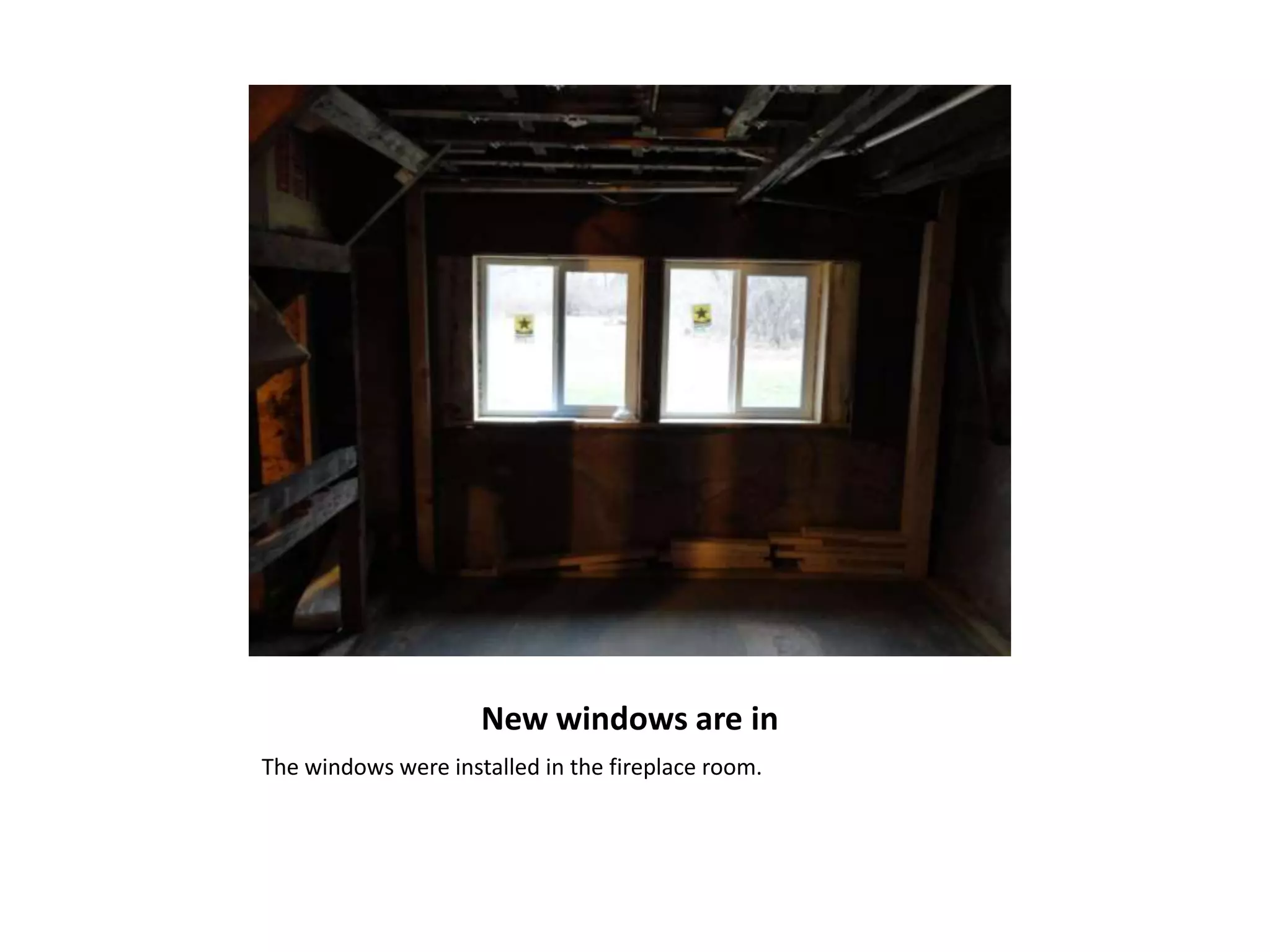 New windows are in
The windows were installed in the fireplace room.
 