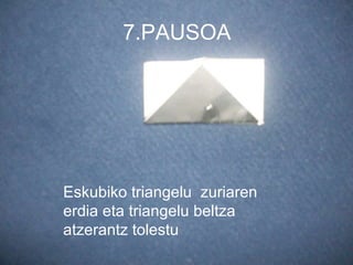 7.PAUSOA Eskubiko triangelu  zuriaren erdia eta triangelu beltza atzerantz tolestu 