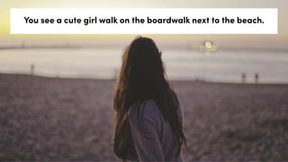 You see a cute girl walk on the boardwalk next to the beach.
 