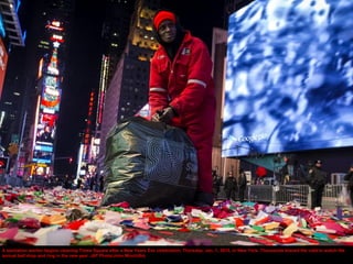 A sanitation worker begins cleaning Times Square after a New Years Eve celebration, Thursday, Jan. 1, 2015, in New York. T...