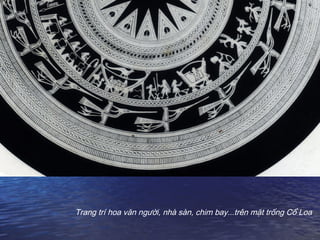 Trang trí hoa văn người, nhà sàn, chim bay...trên mặt trống Cổ Loa
 