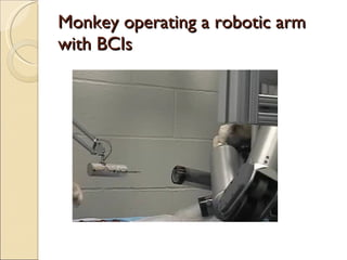 Monkey operating a robotic arm with  BCIs 