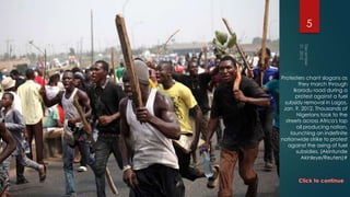 5




Protesters chant slogans as
          they march through
       Ikorodu road during a
        protest against a fuel
  subsidy removal in Lagos,
 Jan. 9, 2012. Thousands of
         Nigerians took to the
  streets across Africa's top
         oil producing nation,
     launching an indefinite
nationwide strike to protest
   against the axing of fuel
        subsidies. (Akintunde
           Akinleye/Reuters)#
 