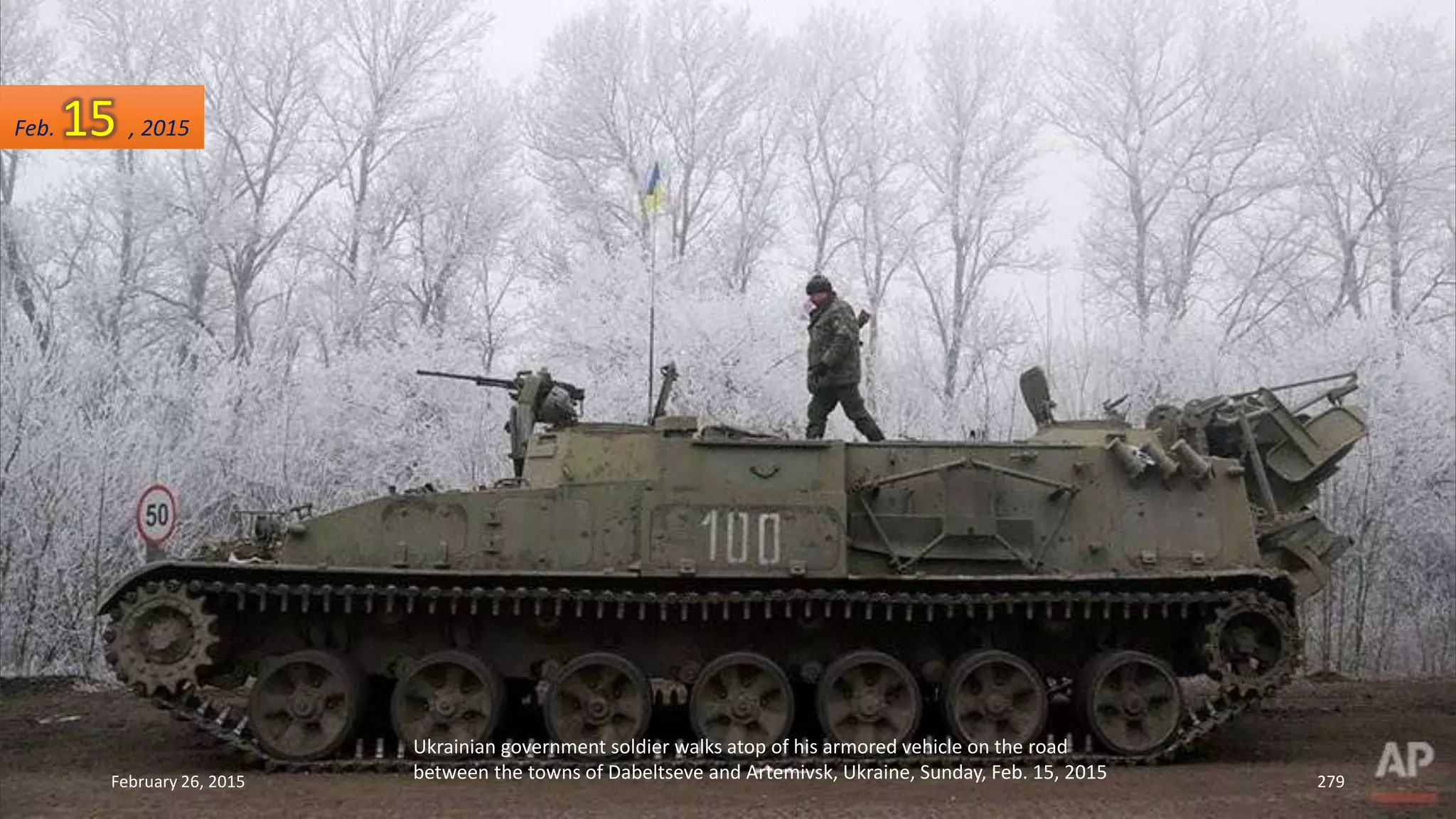Ukrainian government soldier walks atop of his armored vehicle on the road
between the towns of Dabeltseve and Artemivsk, Ukraine, Sunday, Feb. 15, 2015February 26, 2015 279
Feb. 15 , 2015
 