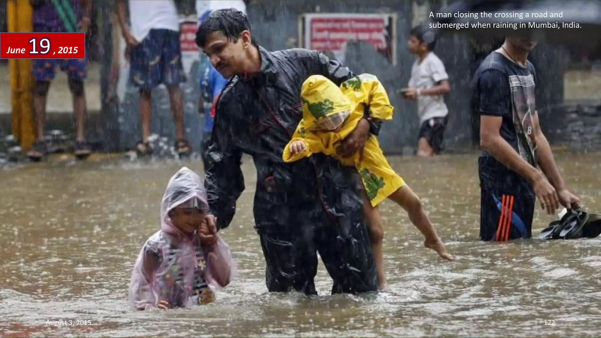 A man closing the crossing a road and
submerged when raining in Mumbai, India.
June 19, 2015
August 3, 2015 122
 