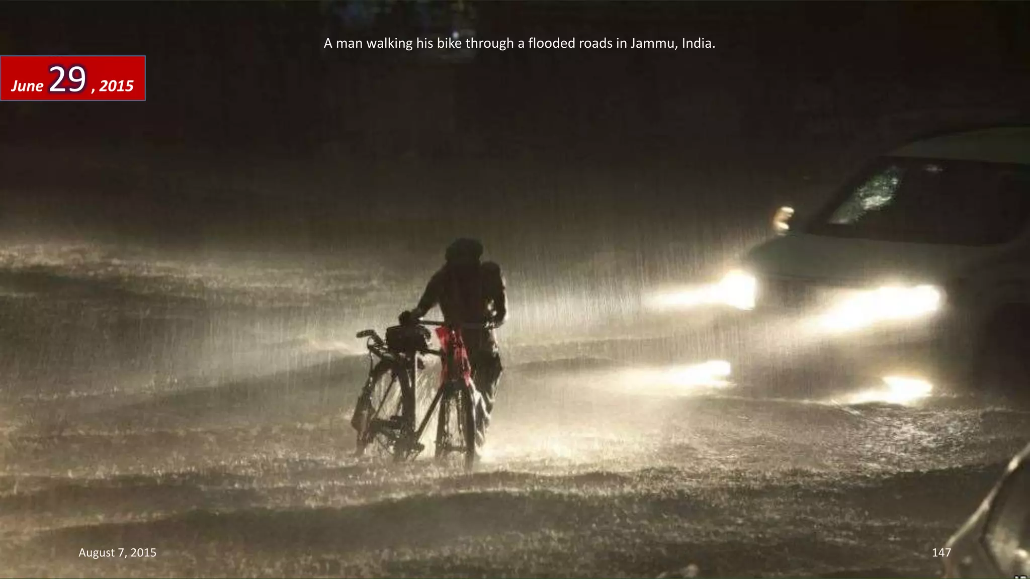 A man walking his bike through a flooded roads in Jammu, India.
June 29, 2015
August 7, 2015 147
 