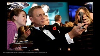 Daniel Craig takes a selfie with a fan at the James Bond "Spectre" premiere in London on Monday, October 26.
 