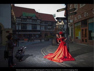 Chinese newlyweds pose for wedding photographs in Thames Town on November 19, 2010 in Songjiang, China
 