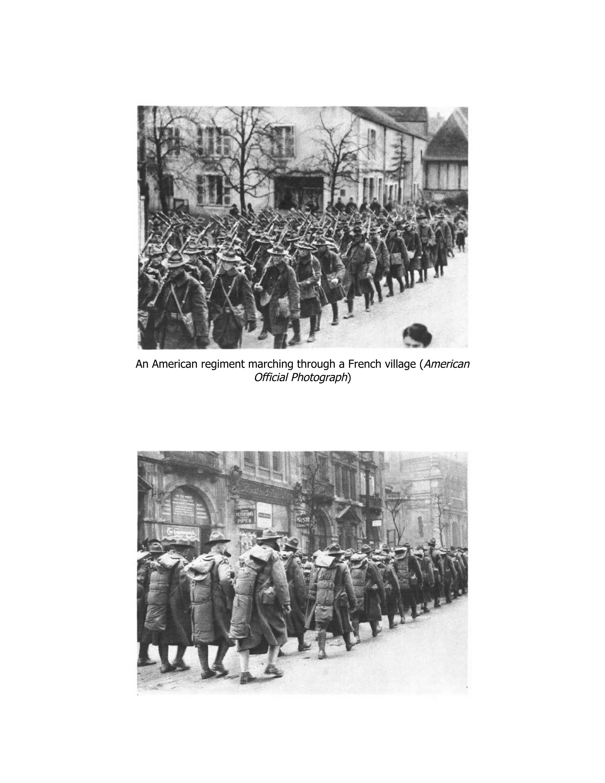 An American regiment marching through a French village (American
Official Photograph)
 
