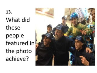 13.
What did
these
people
featured in
the photo
achieve?
 
