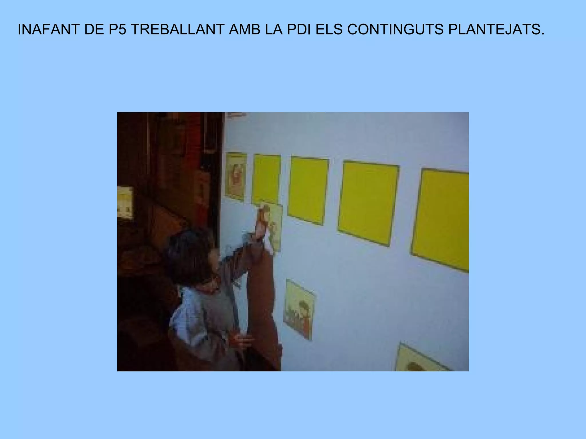 INAFANT DE P5 TREBALLANT AMB LA PDI ELS CONTINGUTS PLANTEJATS.