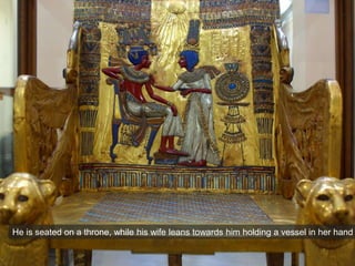 He is seated on a throne, while his wife leans towards him holding a vessel in her hand
 