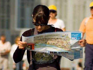 Woman
Looking at
   Map
 