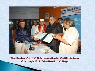 First Ranker, Col. J. K. Sinha Accepting his Certificate from
         G. K. Singh, P. R. Trivedi and U. K. Singh
 
