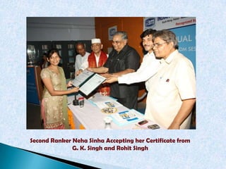 Second Ranker Neha Sinha Accepting her Certificate from
              G. K. Singh and Rohit Singh
 