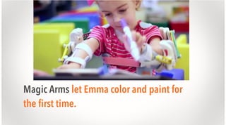 Magic Arms let Emma color and paint for
the first time.

 