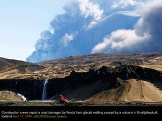 Construction crews repair a road damaged by floods from glacial melting caused by a volcano in Eyjafjallajokull, Iceland  April 17, 2010.  (REUTERS/Lucas Jackson) 