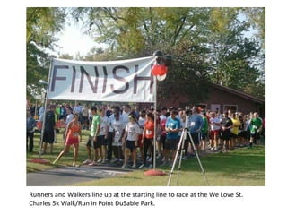 Runners and Walkers line up at the starting line to race at the We Love St.
Charles 5k Walk/Run in Point DuSable Park.
 