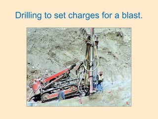 Drilling to set charges for a blast.
 
