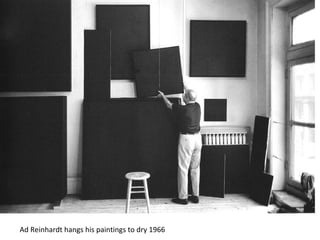 Ad Reinhardt hangs his paintings to dry 1966 