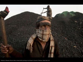 Pakistan’s Waseem Akram takes a break while working at coal depot in Karachi, Pakistan. Shakil Adil / AP
 