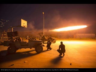 Shi'ite fighters fire a rocket during clashes with Islamic State militants in Salahuddin province, Iraq, March 1, 2015. RE...