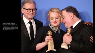 Actress Elisabeth Moss and
producers Warren Littlefield and
Bruce Miller pose with the awards
they won for The Handmaid's Tale
for Best Television Series - Drama.
REUTERS/Lucy Nicholson
 