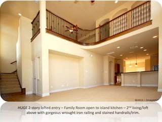 HUGE 2-story lofted entry – Family Room open to island kitchen – 2nd living/loft above with gorgeous wrought iron railing and stained handrails/trim.