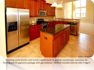 Stunning island kitchen with butlers pantry built-in, granite countertops, oversized tile flooring and SS appliance package with gas cooktop – BONUS included Side-by-Side Fridge!!