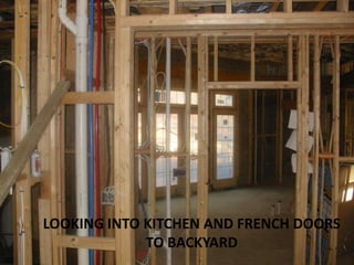 LOOKING INTO KITCHEN AND FRENCH DOORS TO BACKYARD