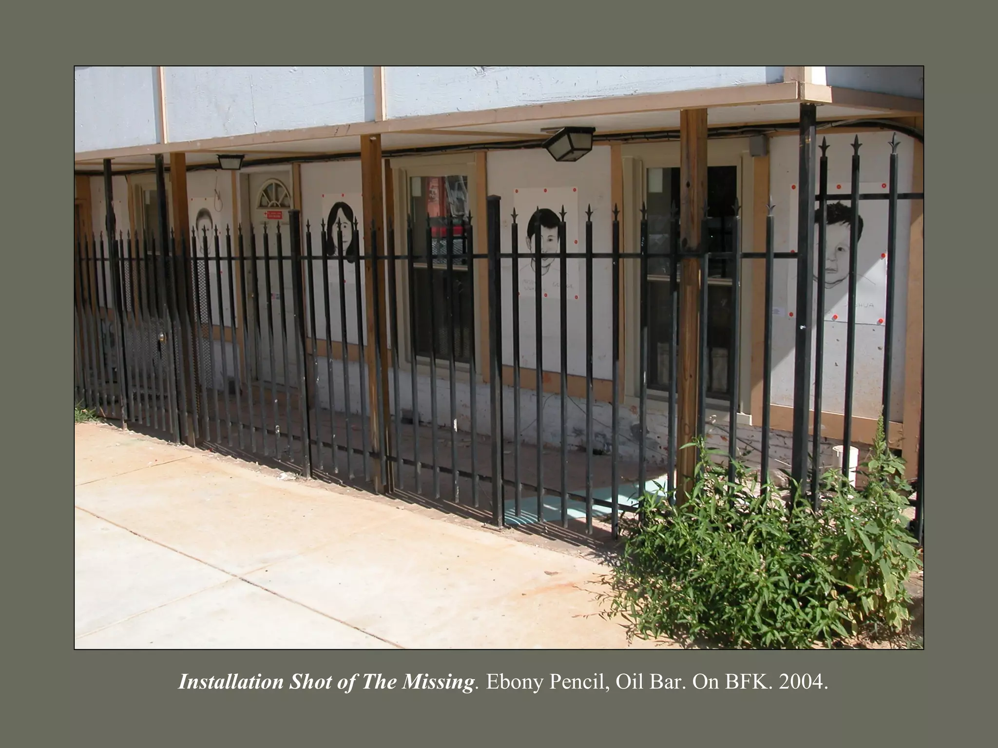 Installation Shot of The Missing. Ebony Pencil, Oil Bar. On BFK. 2004.
 