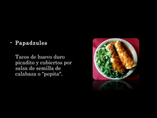 Papadzules Tacos de huevo duro picadito y cubiertos por salsa de semilla de calabaza o "pepita". 