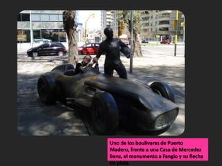 Uno de los boulivares de Puerto Madero, frente a una Casa de MercedezBenz, el monumento a Fangio y su flecha de plata.