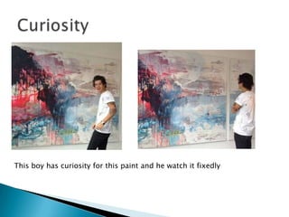 This boy has curiosity for this paint and he watch it fixedly

 