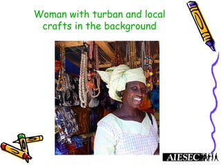 Woman with turban and local
crafts in the background
 