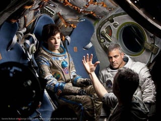 Sandra Bullock with George Clooney and Alfonso Cuaron on the set of Gravity, 2013

 
