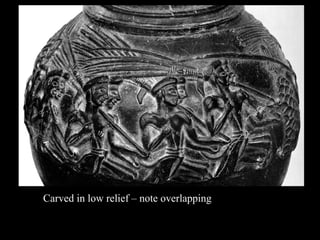 Carved in low relief – note overlapping
 