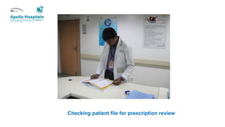 Checking patient file for prescription review
 