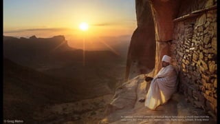An Ethiopian Orthodox priest sits in front of Abuna Yemeta Guh, a church hewn from the
caves some 800-1000 years ago. Hawzen woreda, Tigray region, Ethiopia. © Greg Metro
 