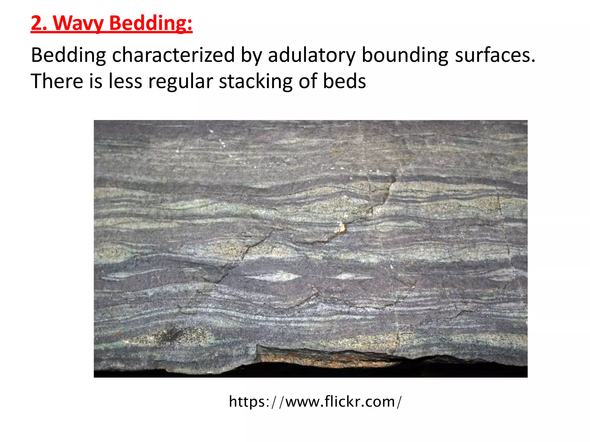 2. Wavy Bedding:
Bedding characterized by adulatory bounding surfaces.
There is less regular stacking of beds
https://www.flickr.com/
 
