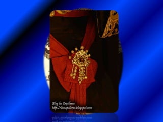 La Virgen de la Salud se presentó vestida de Reina, pero de luto. Con su fajín de Generala, y  un magnifico broche situado en el centro del fajín, con su primera cruz pectoral, …